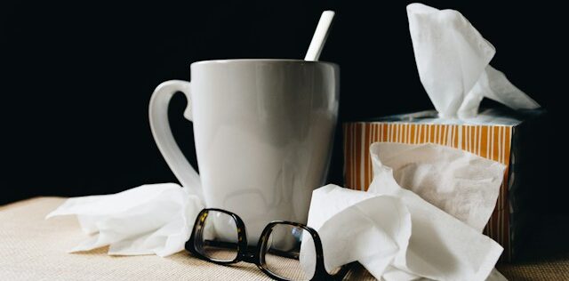 Healthcare professional discussing seasonal flu, infant formula safety and menopause treatment updates with a patient